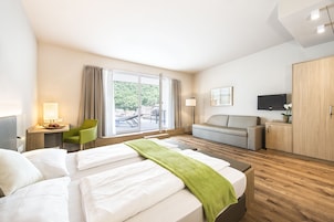 Loft | Hypo-allergenic bedding available, minibar, in-room safe, desk