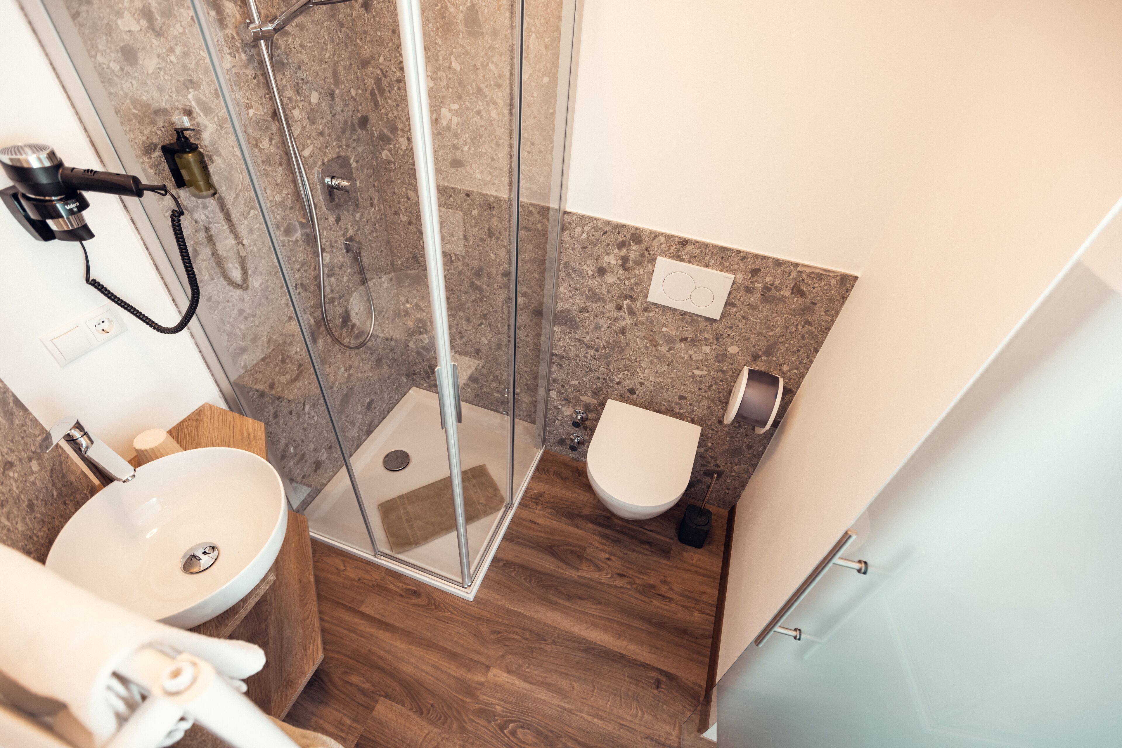 economy single room | bathroom | shower, hair dryer, slippers, towels