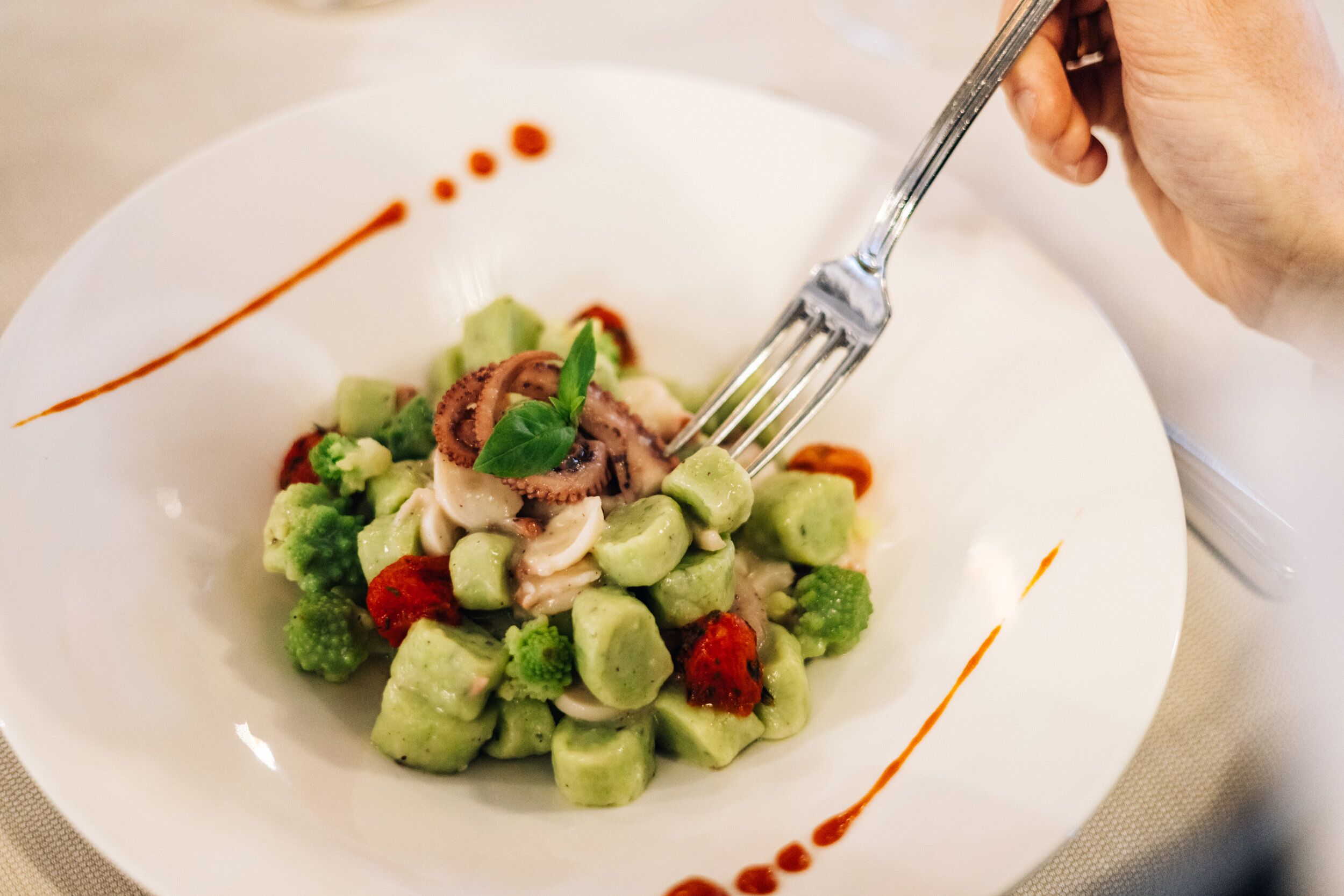 A plate of food with a fork.
