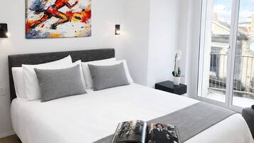 Doppia Deluxe | Copriletto in piuma, materassi in memory foam, una cassaforte in camera