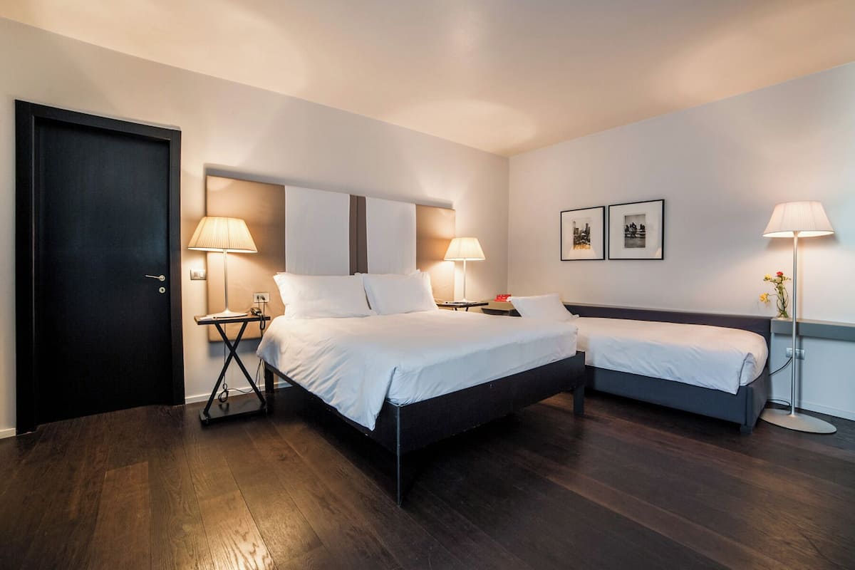 superior triple room | frette italian sheets, premium bedding, down duvets, minibar