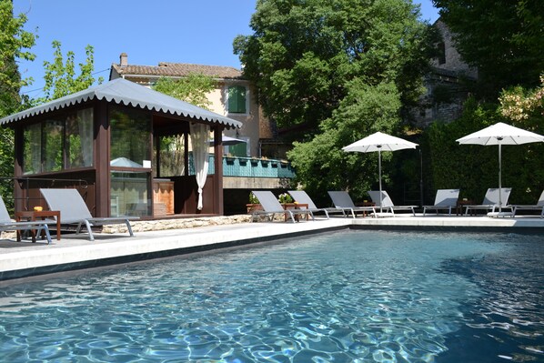 Seasonal outdoor pool, pool umbrellas, pool loungers