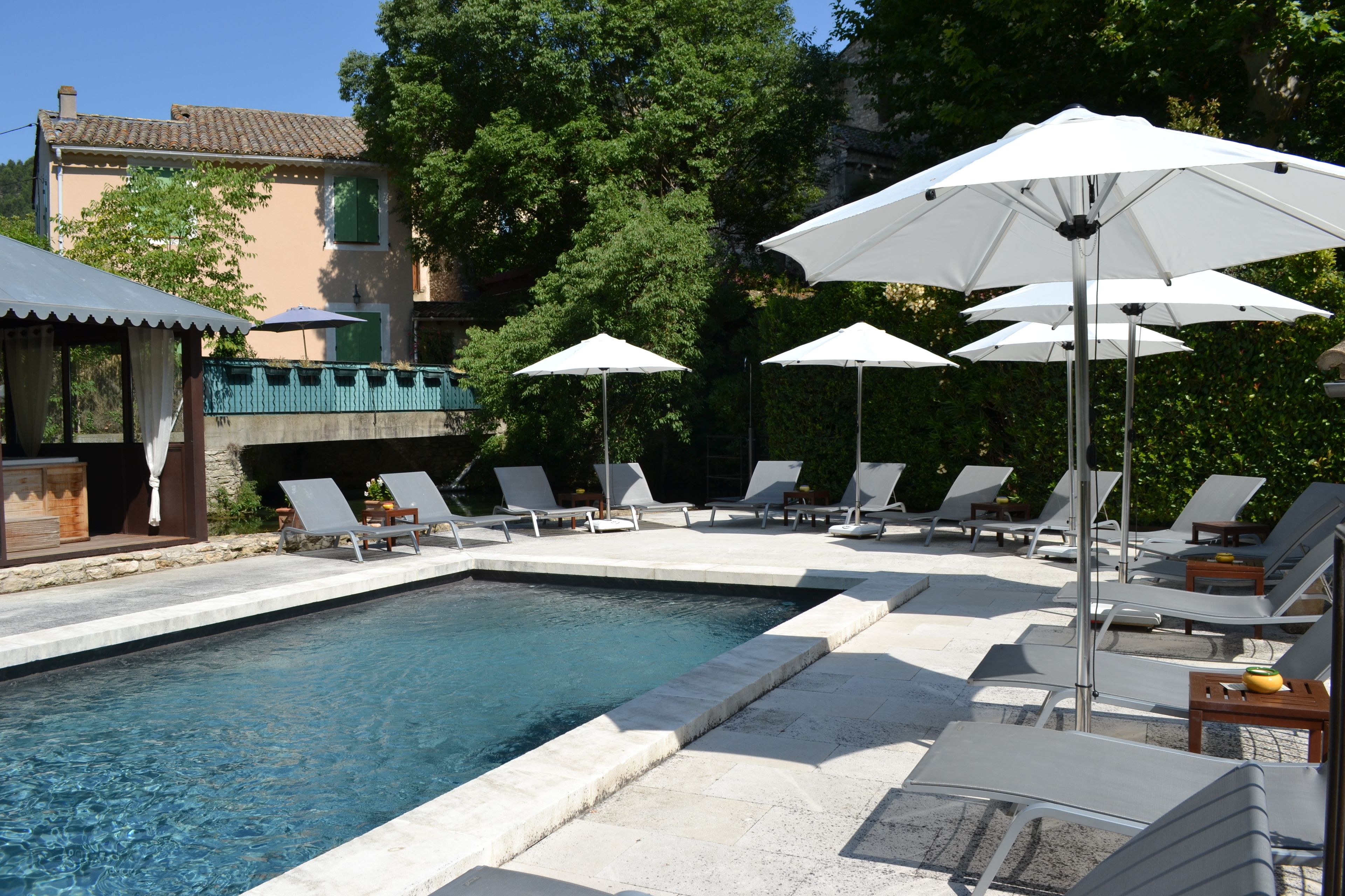 seasonal outdoor pool, pool umbrellas, pool loungers