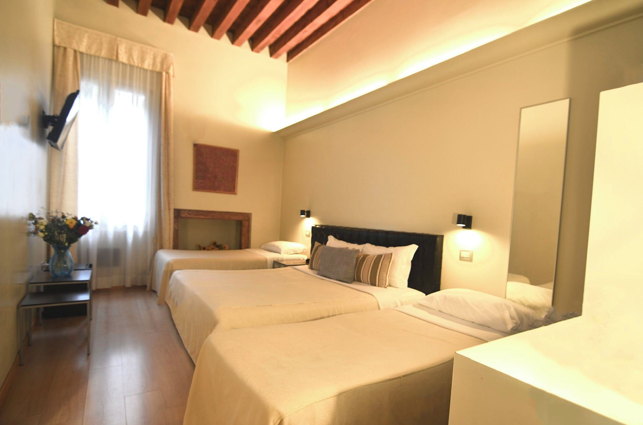 Quadruple Room | Minibar, in-room safe, desk, free WiFi