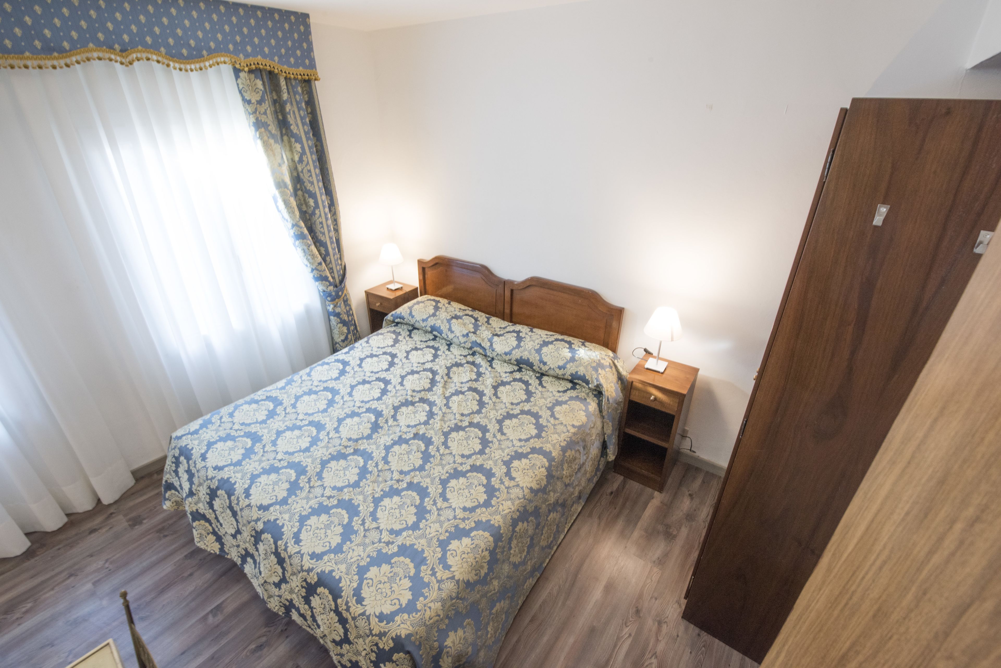 double room with private shower but shared toilet | down duvets, in-room safe, individually furnished, desk