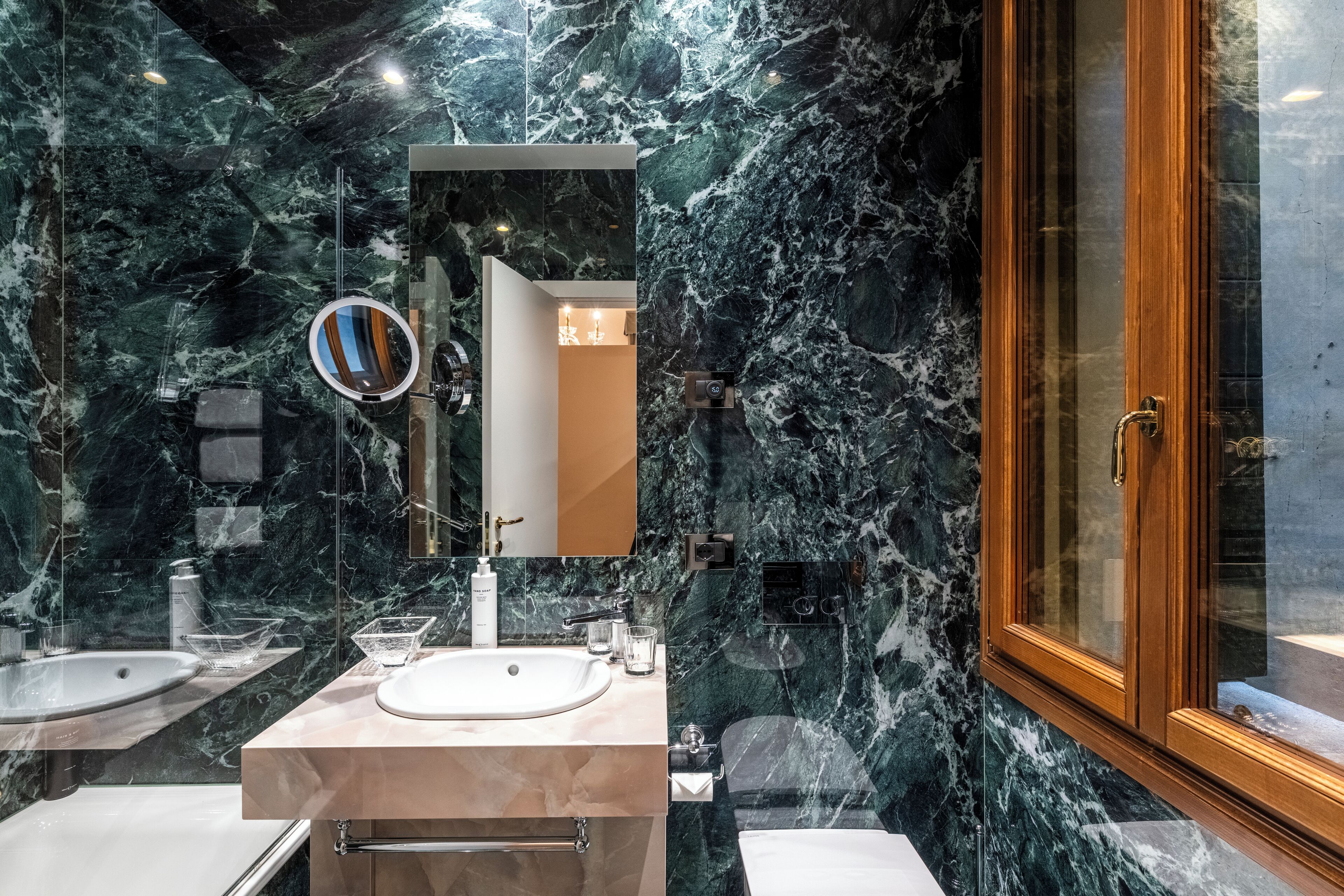 deluxe double or twin room, canal view, annex building | bathroom | free toiletries, hair dryer, towels, soap