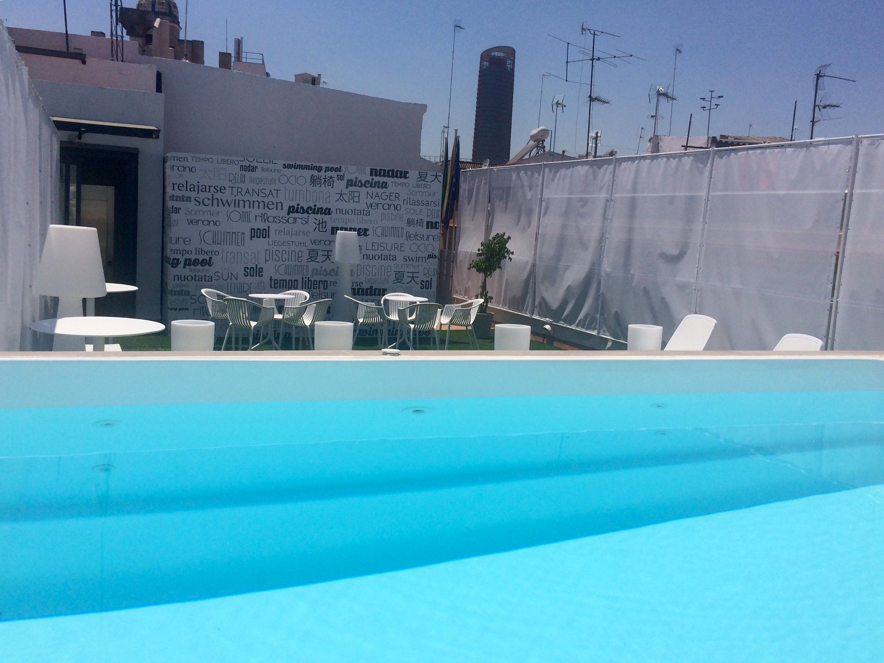 seasonal outdoor pool, open 10:00 am to 9:30 pm, pool umbrellas