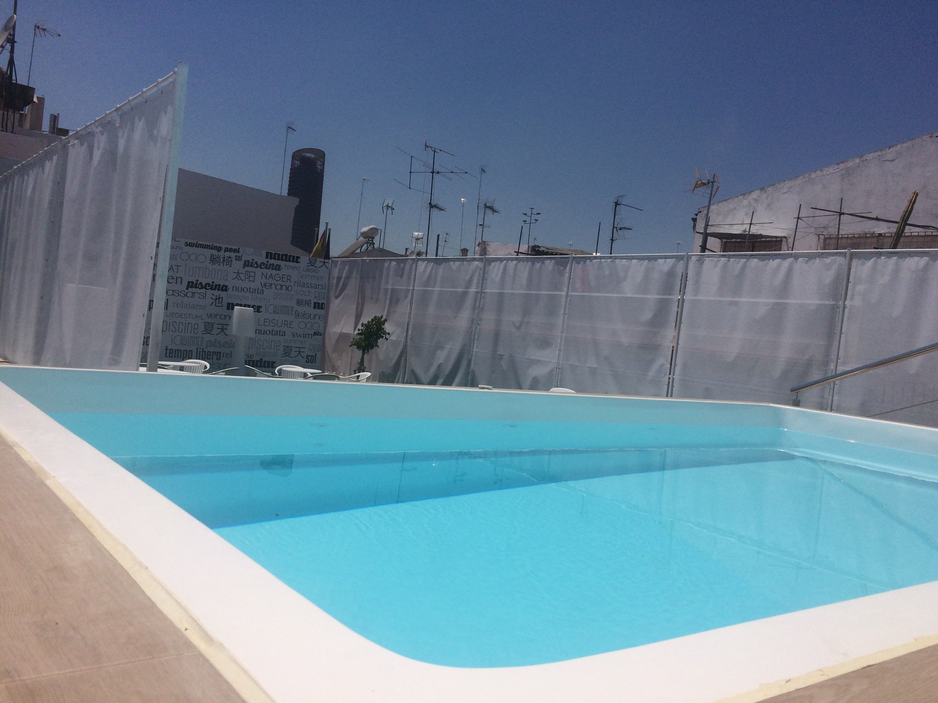 seasonal outdoor pool, open 10:00 am to 9:30 pm, pool umbrellas