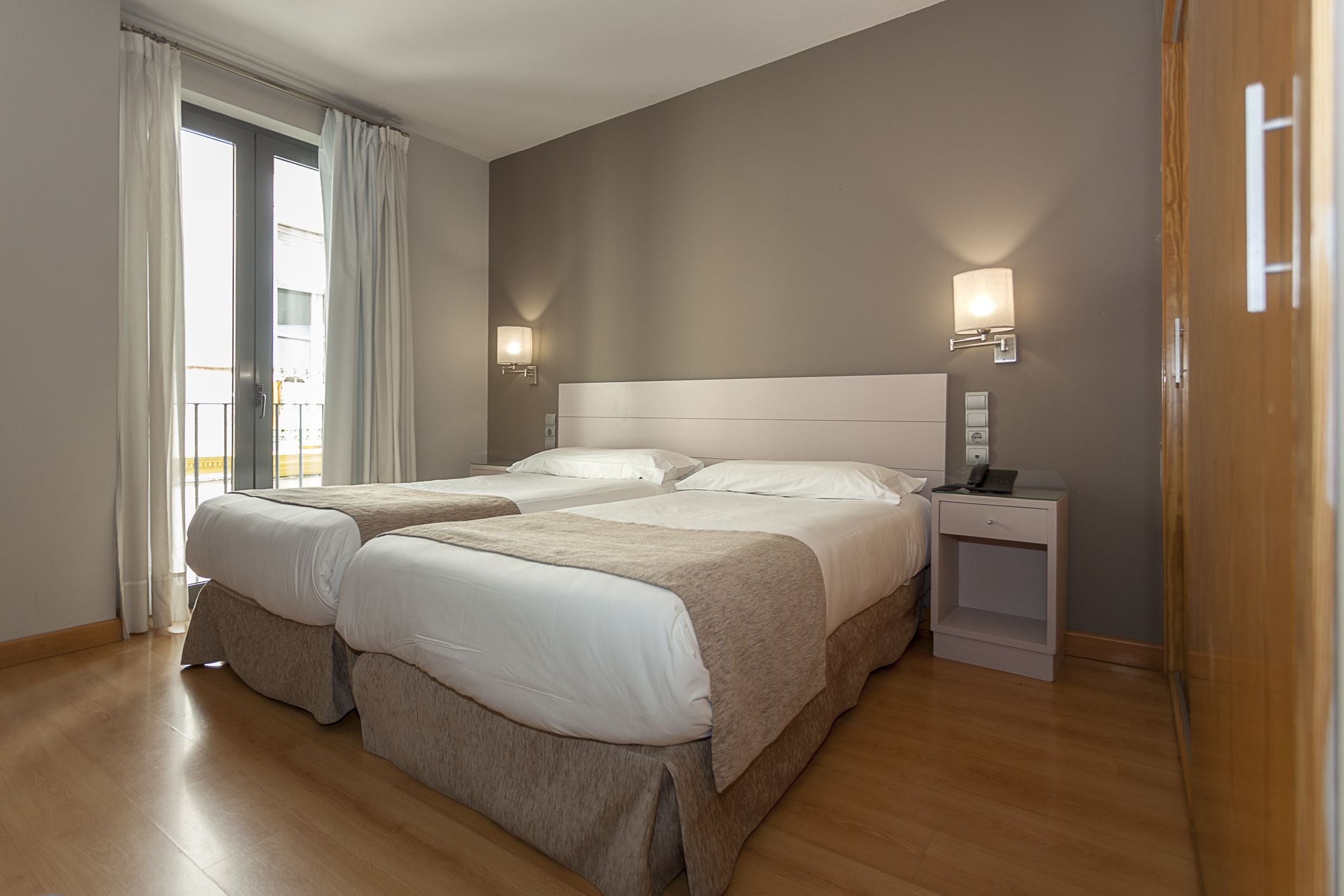 double room, balcony | in-room safe, desk, soundproofing, iron/ironing board