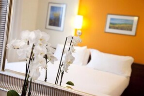 Down duvets, pillow-top beds, minibar, desk