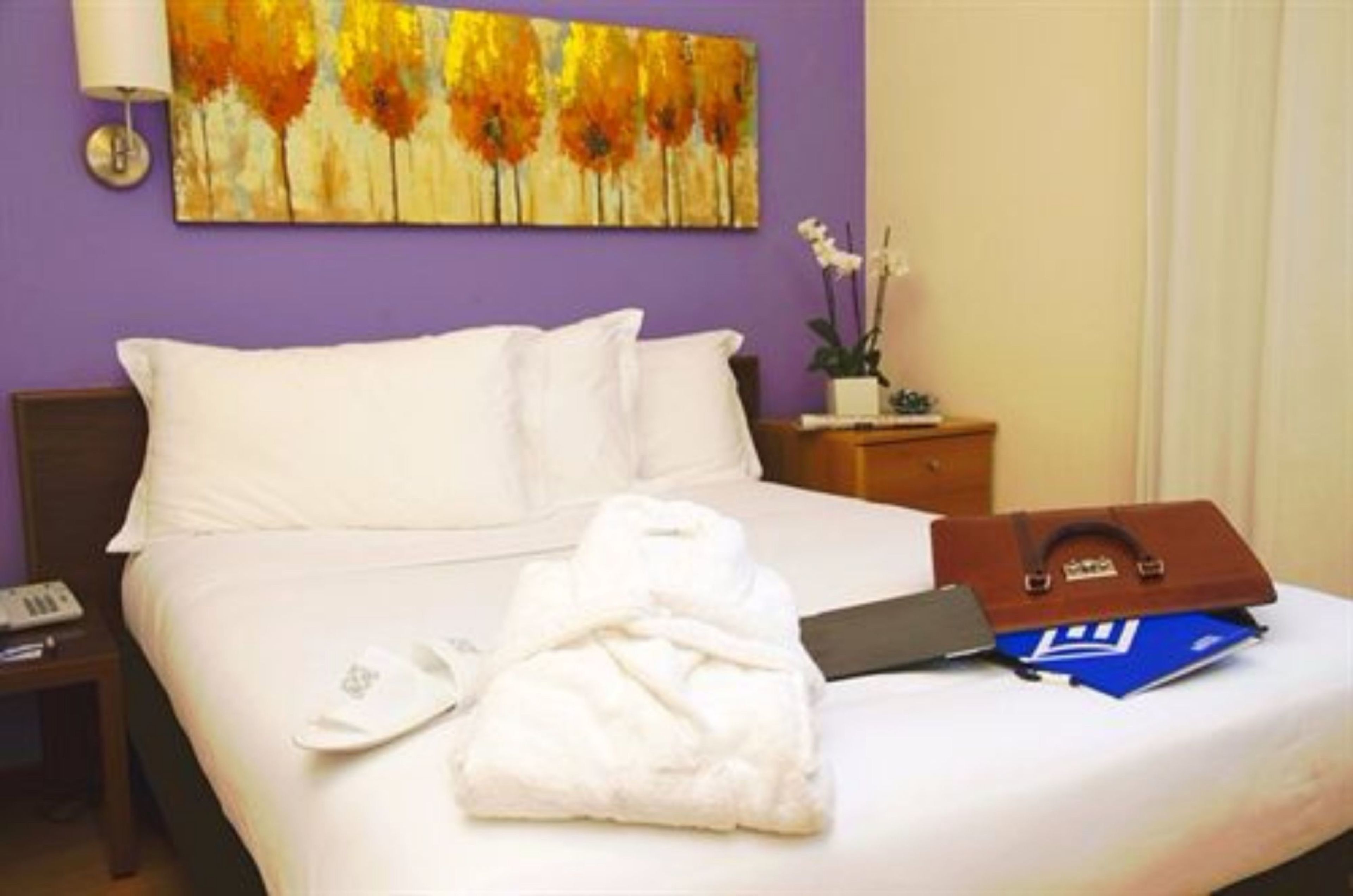 down duvets, pillow-top beds, minibar, desk