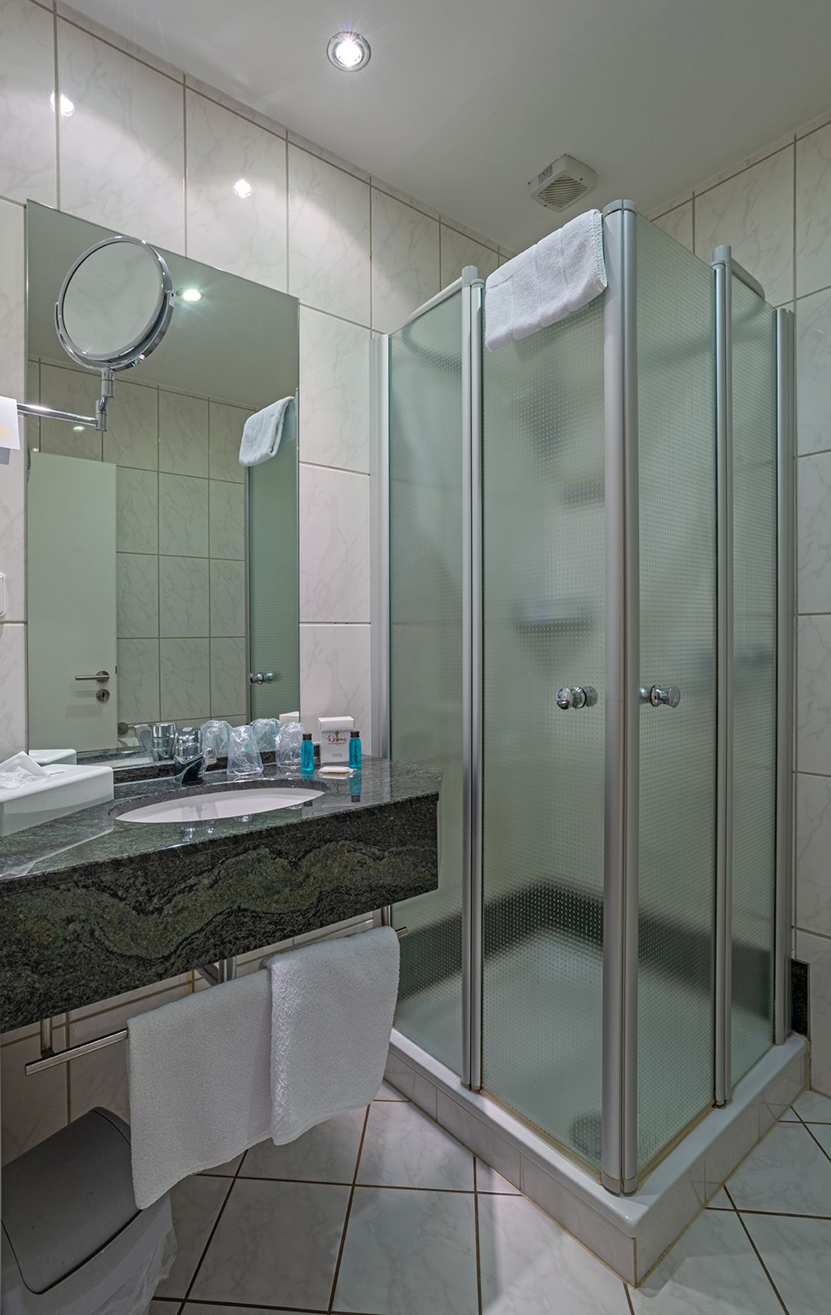 shower, free toiletries, hair dryer, towels