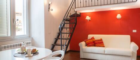 Superior Studio | Living area | Flat-screen TV