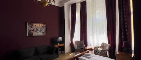 Triple Room | Individually decorated, blackout drapes, free cribs/infant beds