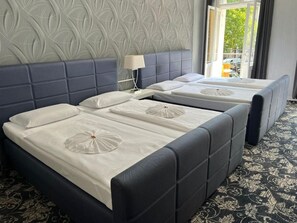 Chambre Quadruple Affaires