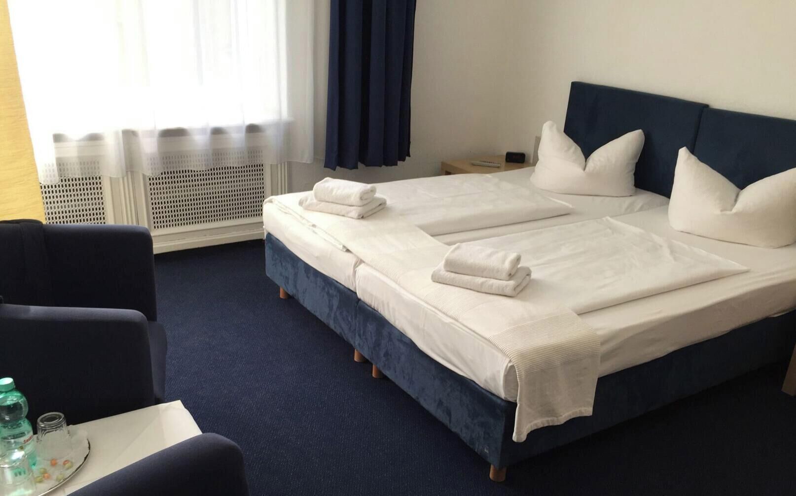 Hypo-allergenic bedding, in-room safe, blackout curtains
