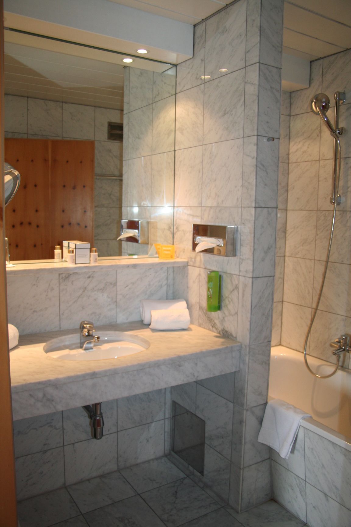 hair dryer, bathrobes, slippers, towels