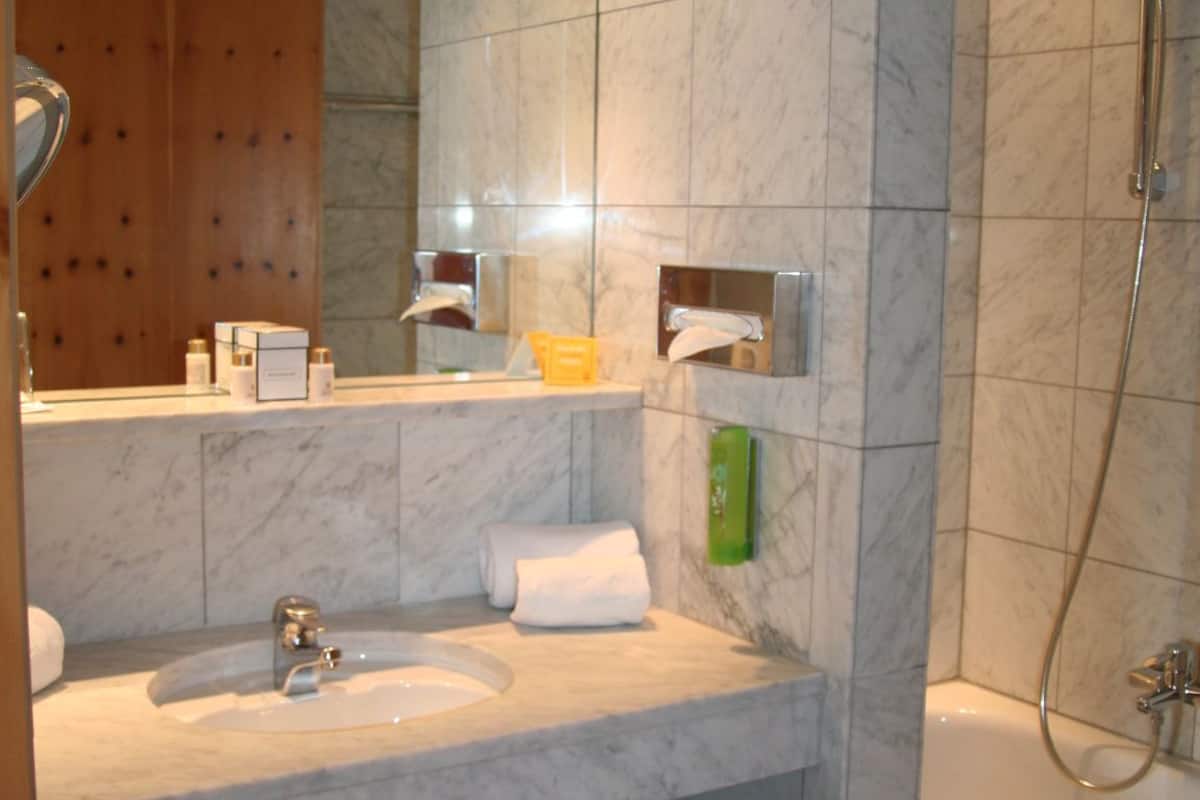 hair dryer, bathrobes, slippers, towels