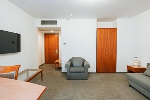 Junior Suite | Living area | 50-cm TV with cable channels