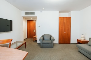 Family Room | Minibar, in-room safe, soundproofing, iron/ironing board