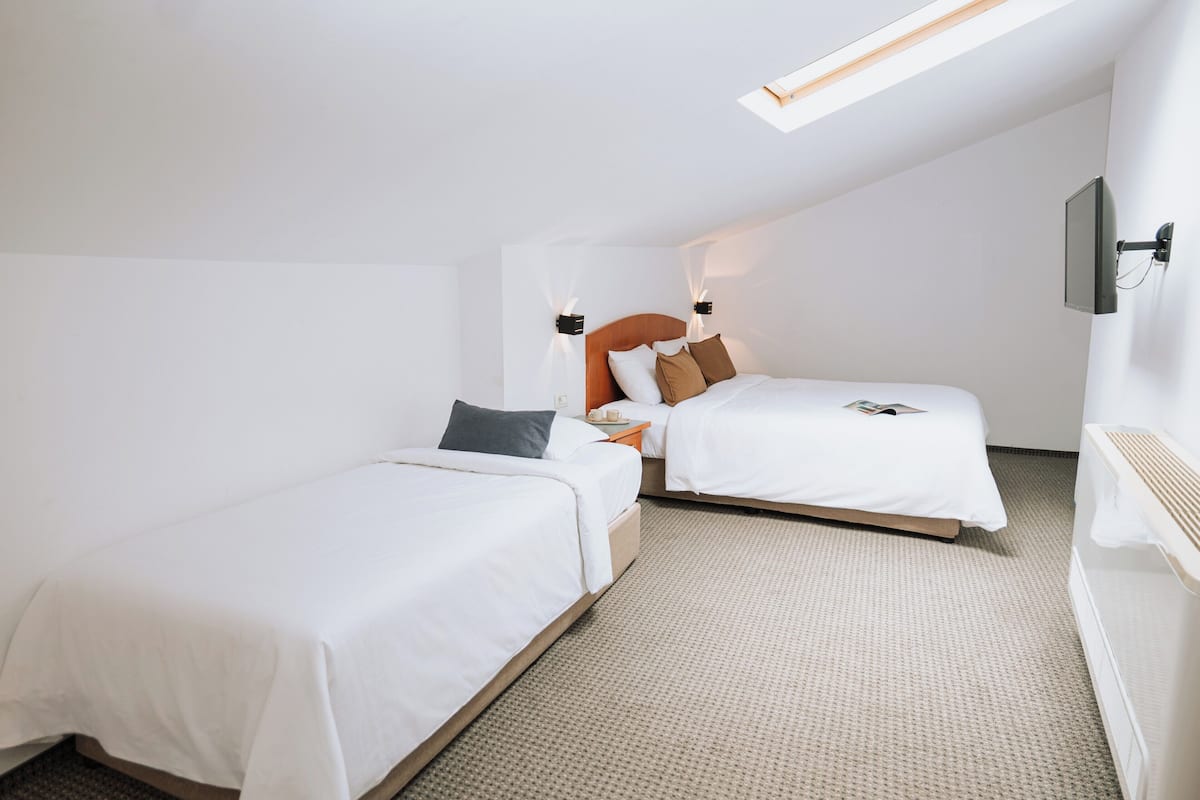 Family Room | Minibar, in-room safe, desk, iron/ironing board