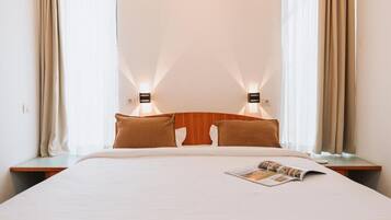 Family Room | Minibar, in-room safe, desk, iron/ironing board