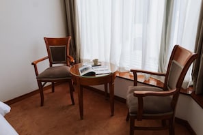 Classic Twin Room | Minibar, in-room safe, soundproofing, iron/ironing board