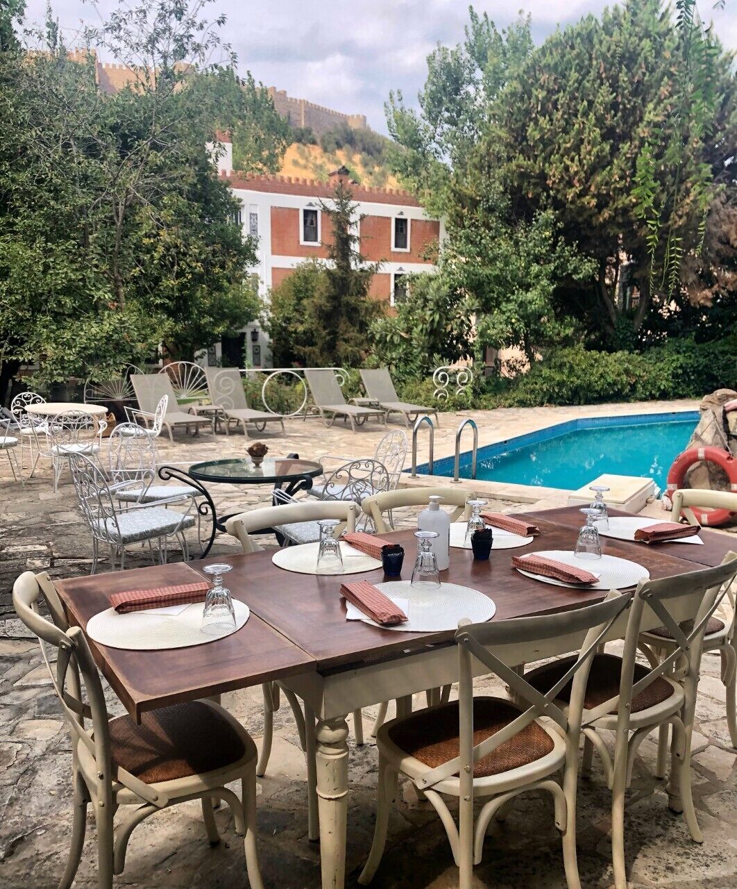 seasonal outdoor pool, open 8:00 am to 8:00 pm, pool umbrellas