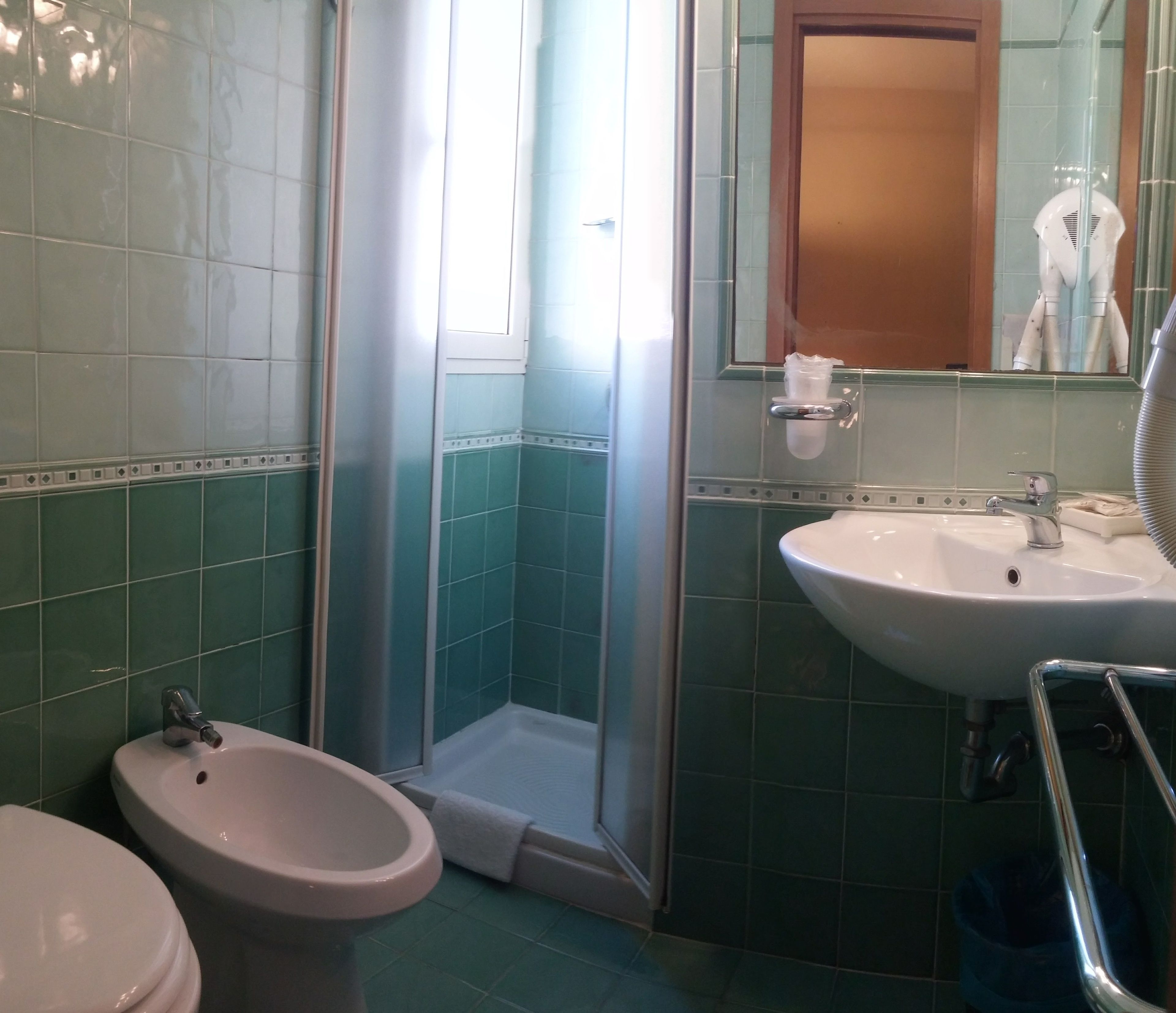 free toiletries, hair dryer, bidet, towels