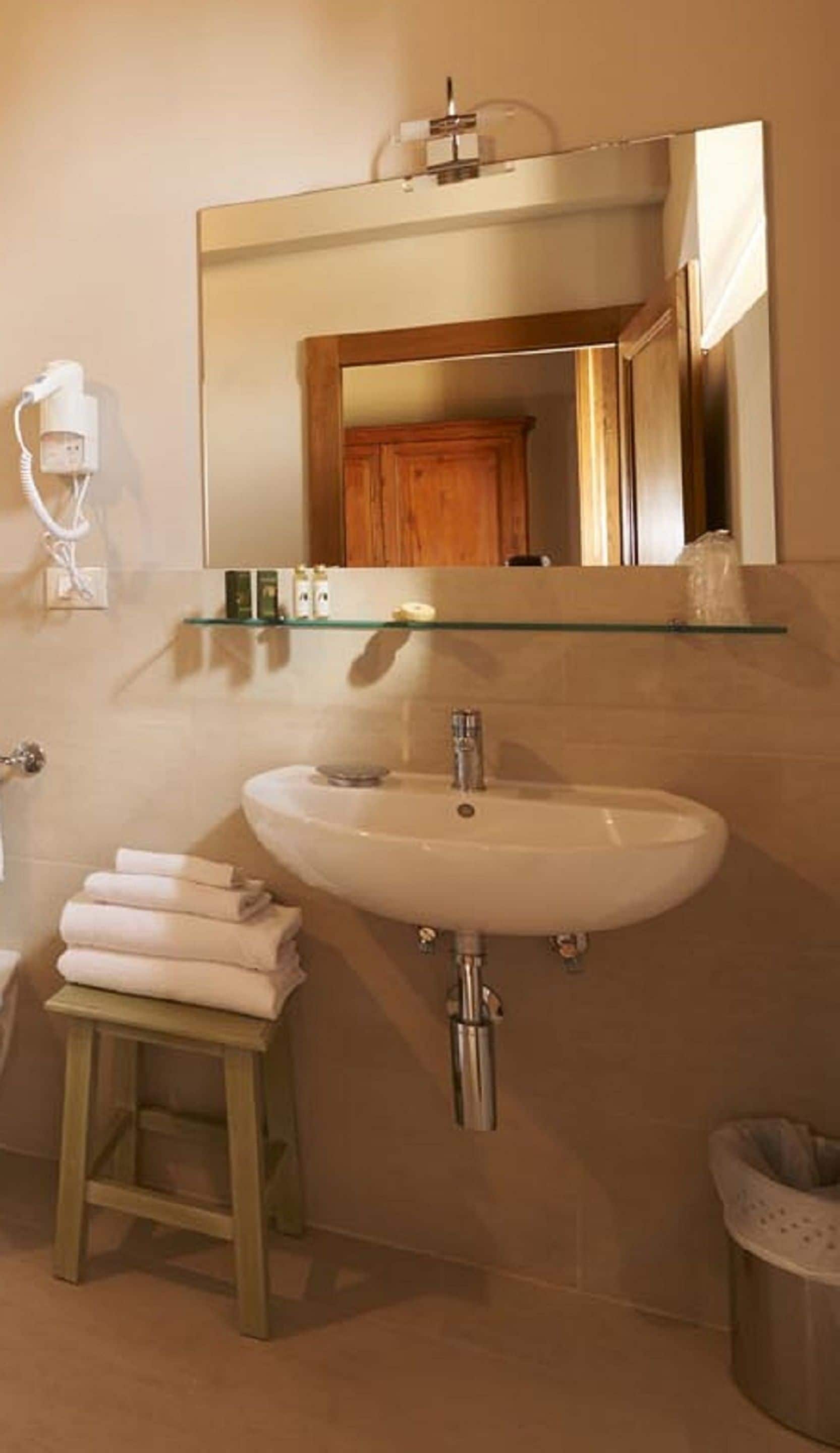 free toiletries, hair dryer, bidet, towels