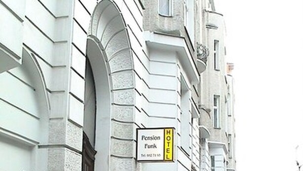 A building with a sign for 'Pension Funk Hotel' and a visible entrance. - Hotel-Pension Funk (Berlin)