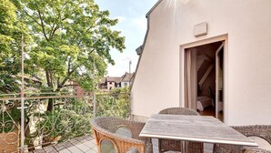 toppleilighet med tekjøkken and roof terrace | Terrasse/patio