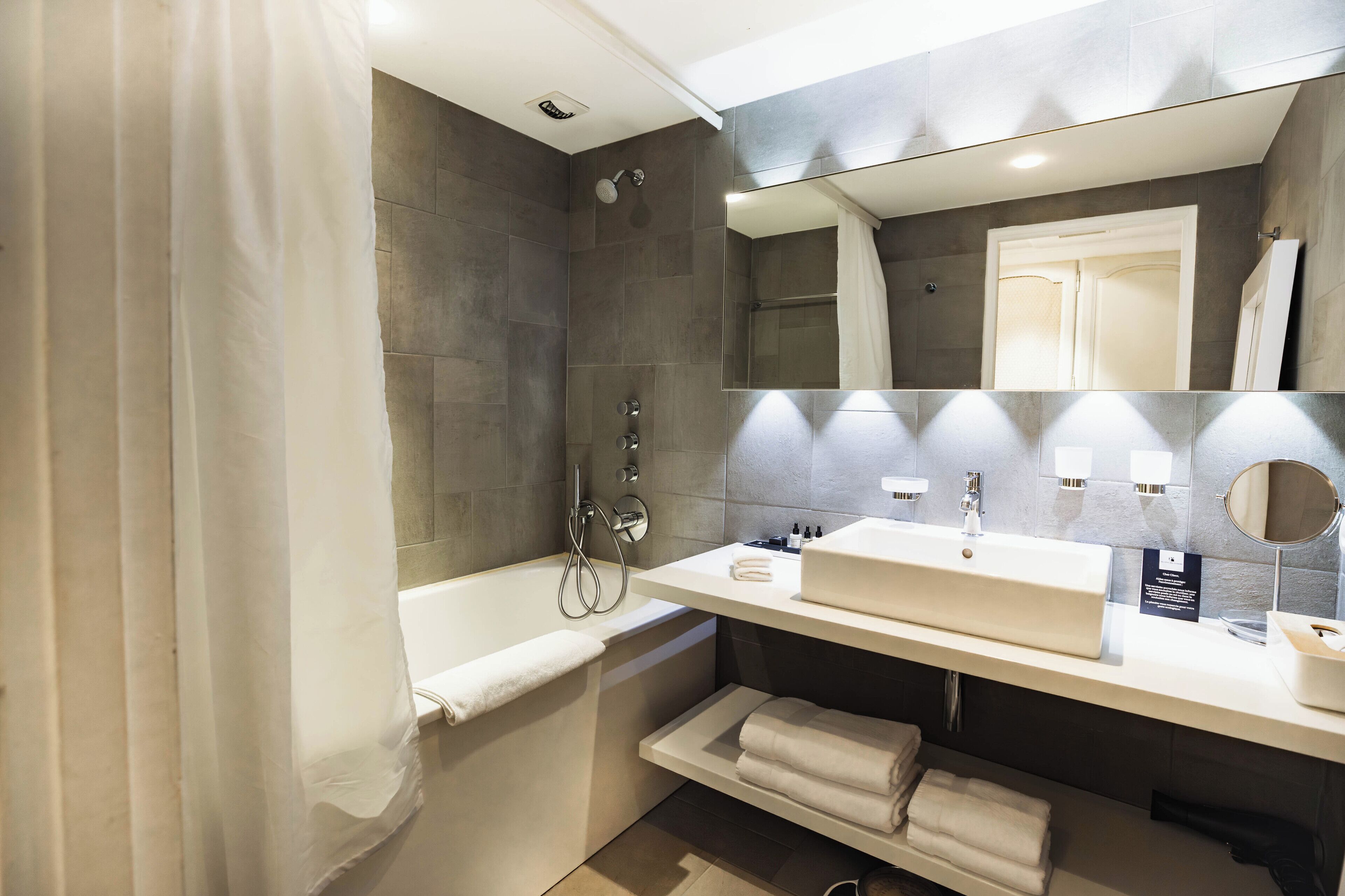 comfort double room, bathtub | bathroom | designer toiletries, hair dryer, bathrobes, slippers