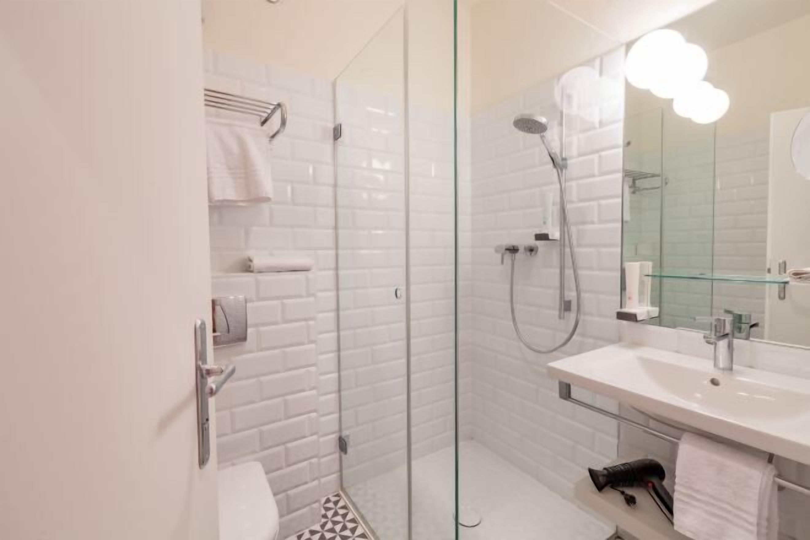 Bathroom | Free toiletries, hair dryer, slippers, towels