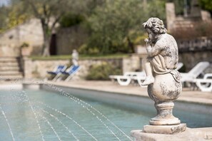 Outdoor pool, open 8 AM to 8 PM, pool loungers