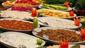 A buffet with various dishes and fruits. - Ayasofya Hotel - Special Class (Istanbul)