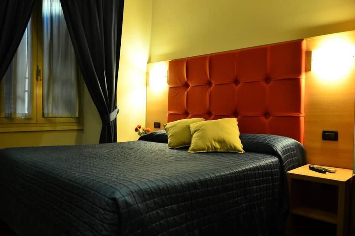 Economy Double Room | Down duvets, minibar, in-room safe, desk