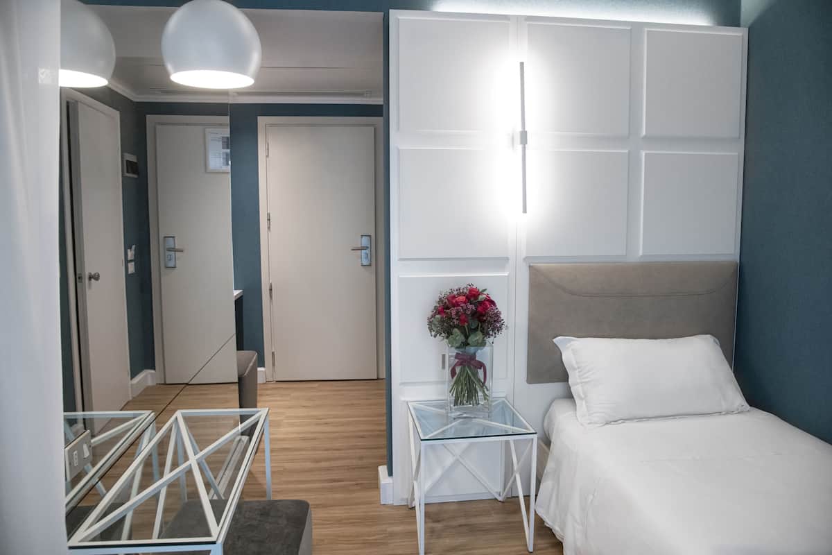 Executive eenpersoonskamer (Excelsior) | 1 slaapkamer, een minibar, een kluis op de kamer, een bureau