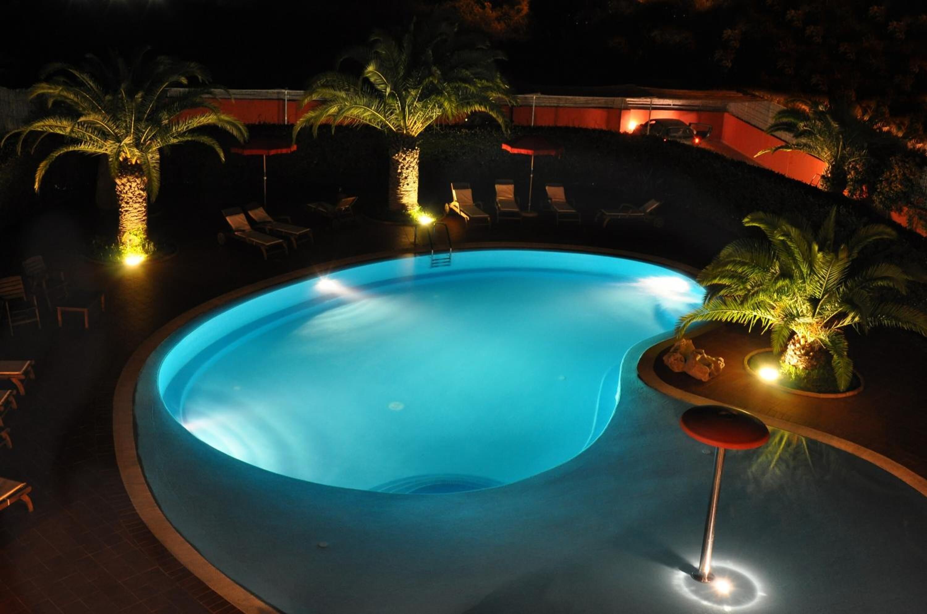 seasonal outdoor pool, pool umbrellas, pool loungers