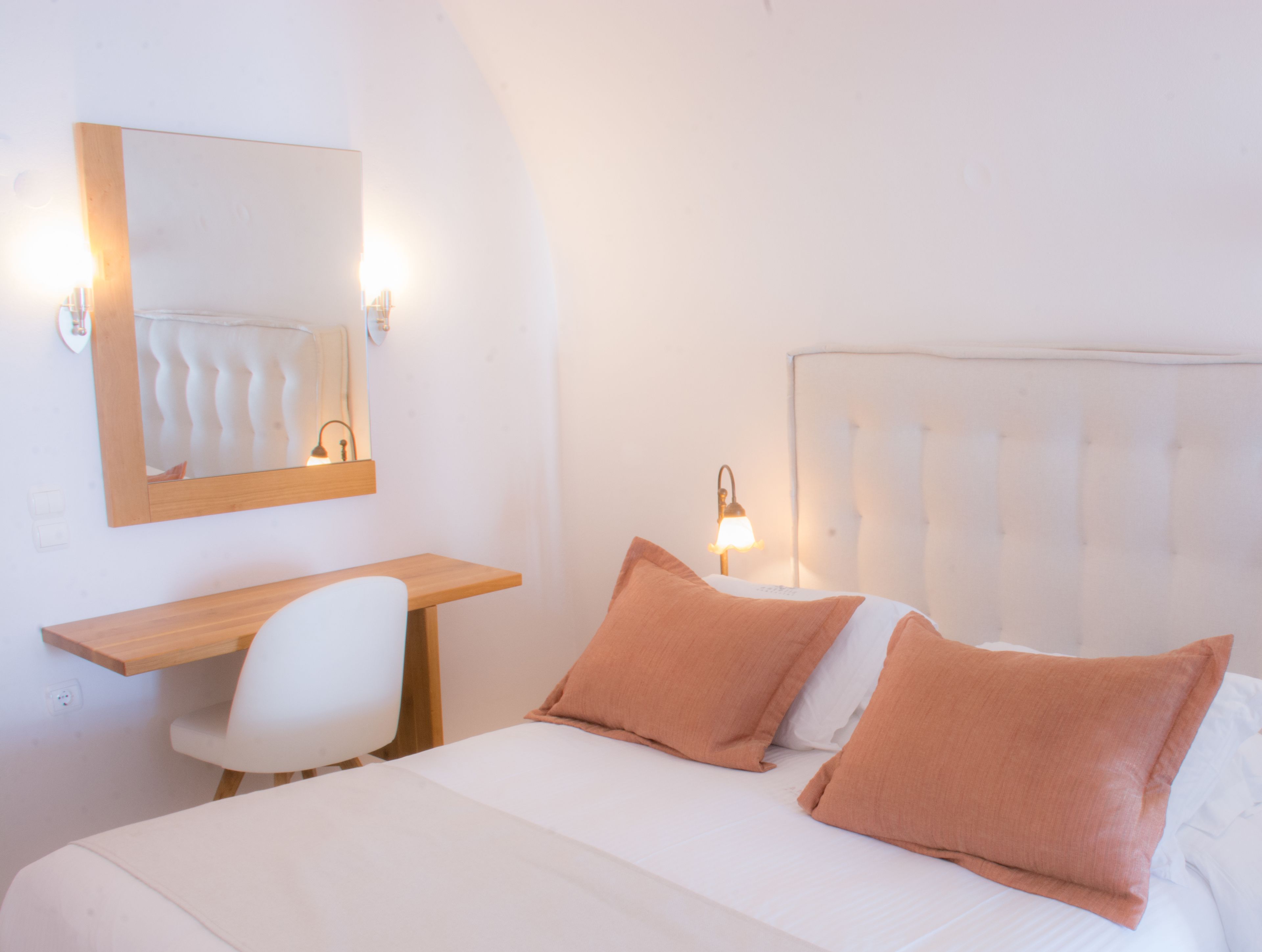 Hypo-allergenic bedding, down comforters, minibar, in-room safe