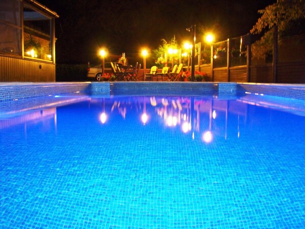 Seasonal outdoor pool, pool umbrellas, pool loungers