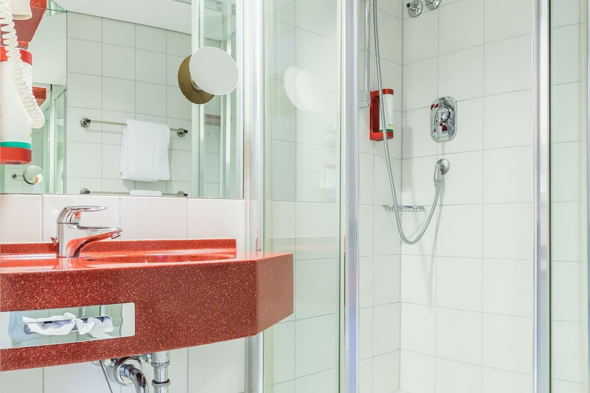 shower, deep-soaking bathtub, free toiletries, hair dryer