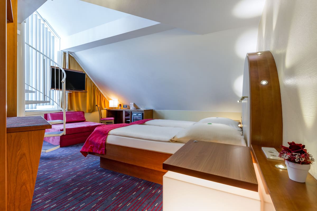 suite | hypo-allergenic bedding, desk, laptop workspace, blackout curtains