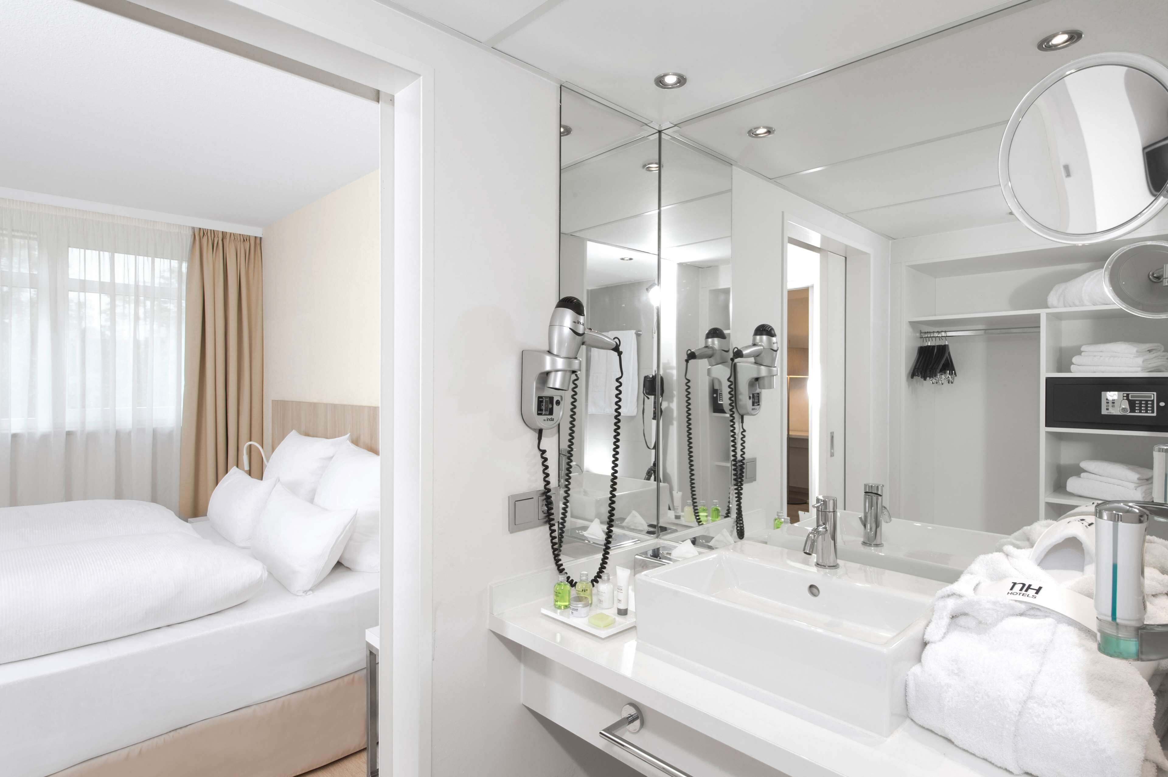 deep-soaking bathtub, rainfall showerhead, eco-friendly toiletries