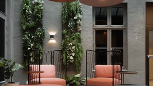 A modern interior with two sofas, a coffee table, and pendant lights. - Citybox Oslo (Oslo)