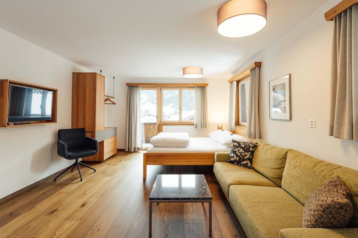 apartment (4 beds) | living area | 80-cm flat-screen tv with cable channels, tv