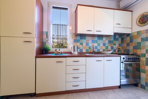 Apartment, 2 Bedrooms | Private kitchen | Coffee/tea maker