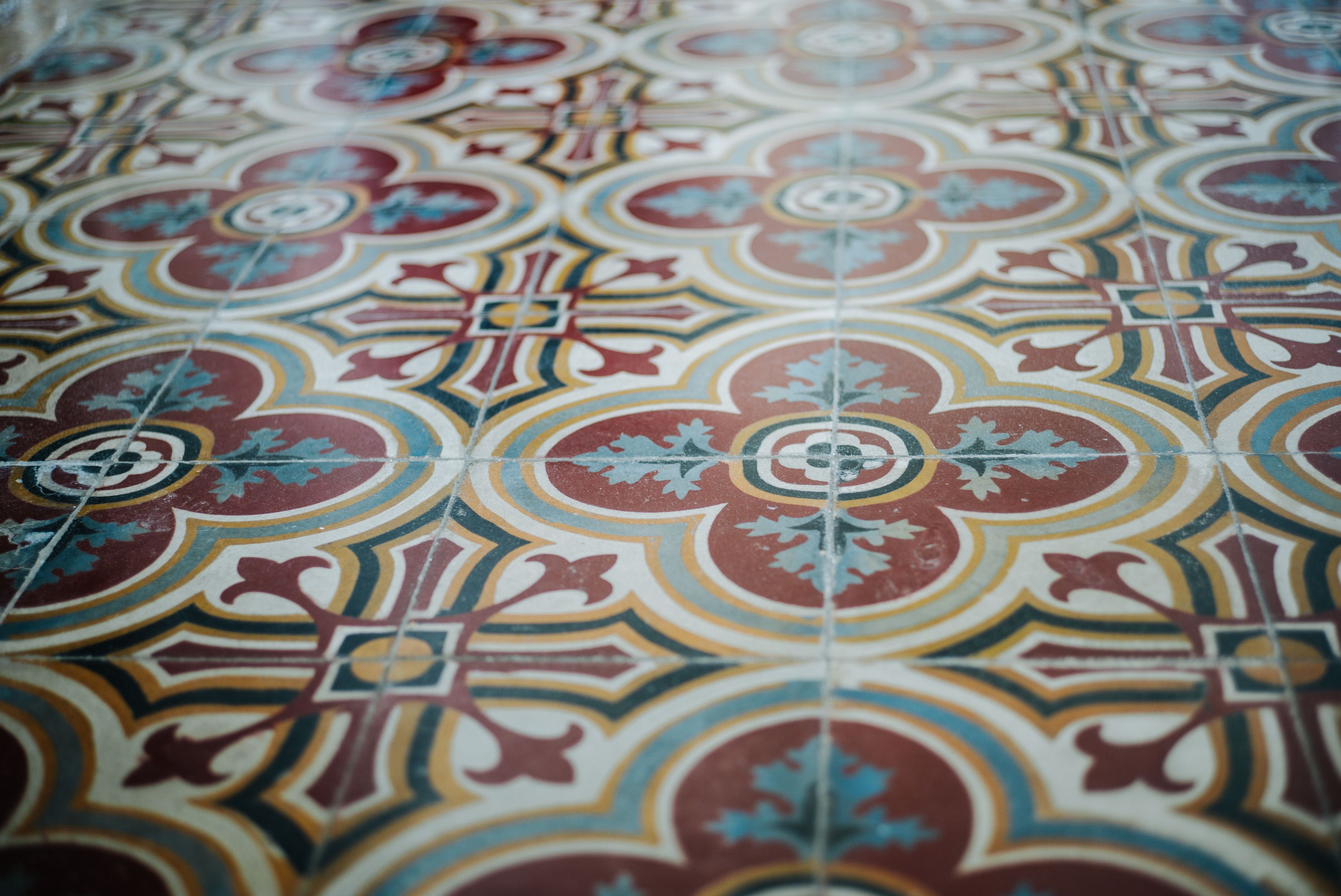 A detailed view of a patterned floor with a symmetrical design.