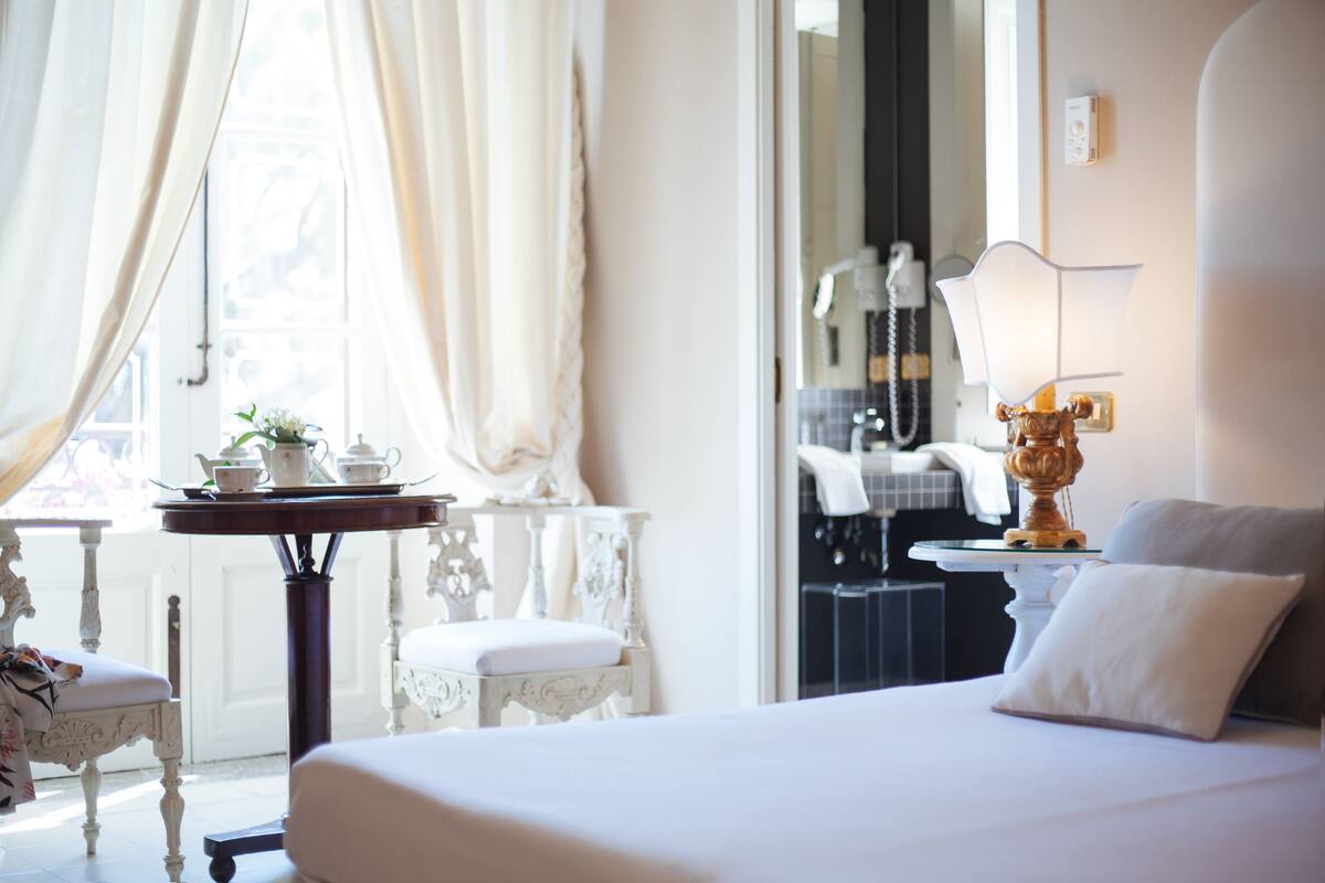 junior suite | premium bedding, in-room safe, blackout curtains, iron/ironing board