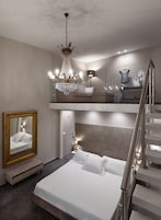 Premium bedding, down duvets, minibar, in-room safe